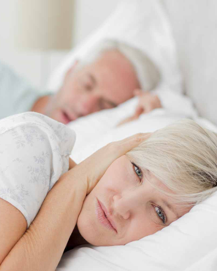 Woman upset by partner's snoring